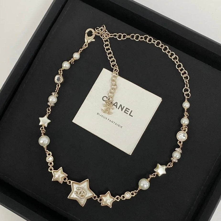 Chanel Pearl Star Necklace Bracelet Earrings
